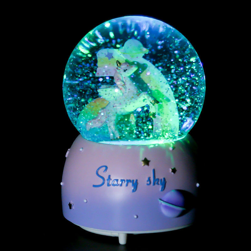 pink unicorn snow globe music box