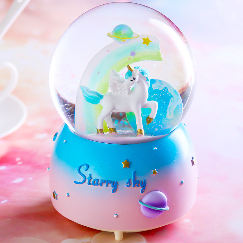 pink unicorn snow globe music box