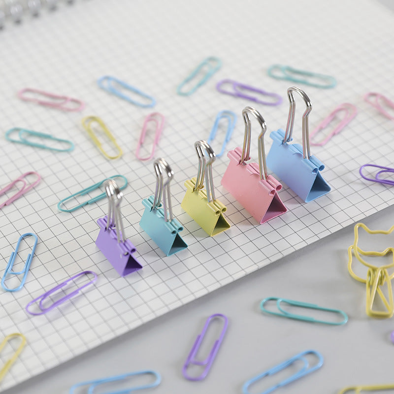 office supply binder clips in different colors