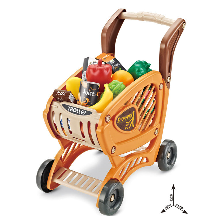 preschooler using red toy shopping cart outdoors