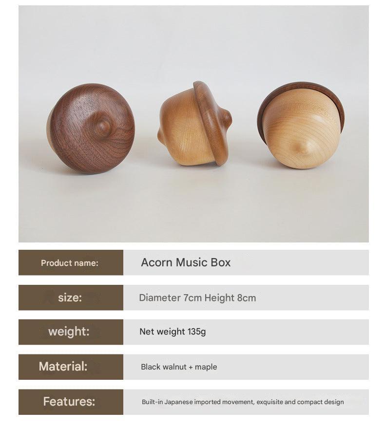 rotating wooden acorn music box close-up