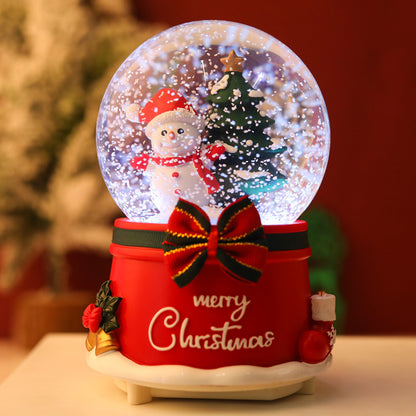 Detailed artisan Christmas snow globe with snowman