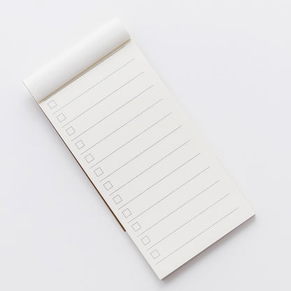 top view of a square notepad on a table