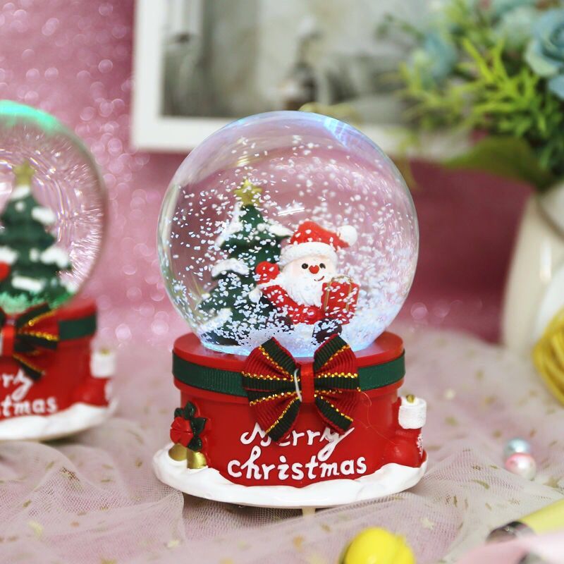 Christmas snow globe with music and light details