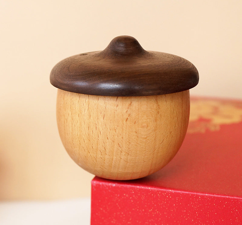 handcrafted acorn music box wood texture