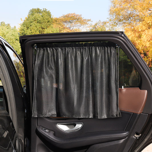 black mesh fabric car sunshade on window