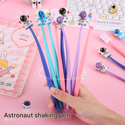 Cute astronaut-shaped pen with deep blue ink