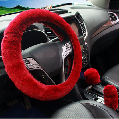 plush pink steering wheel cover in car