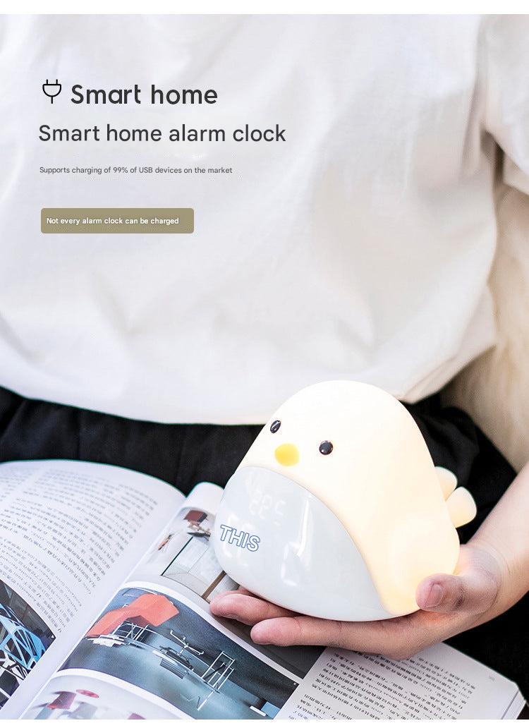 bedside white bird alarm clock with digital display