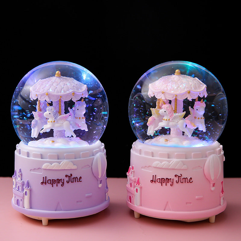 carousel music box with snow drift feature