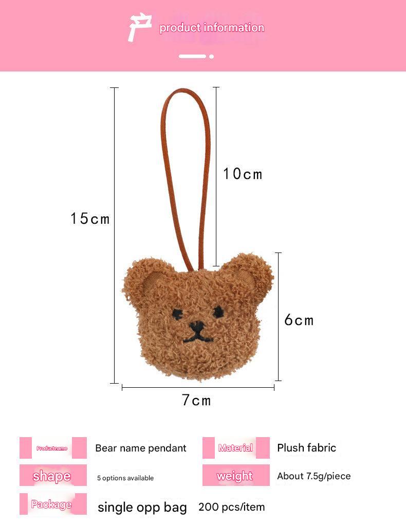 soft toy bear with bow ID tag