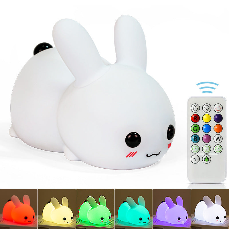 Interactive silicone rabbit night light in a child's room