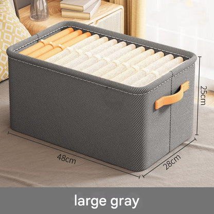 Modern foldable grey storage bin with items