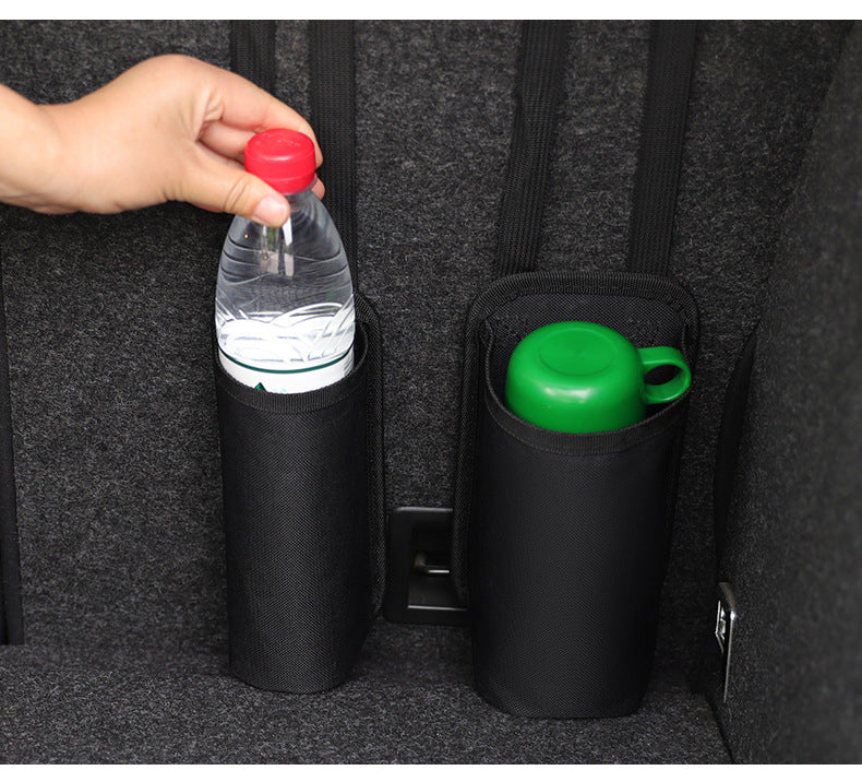 vehicle accessory storage with bottle holders