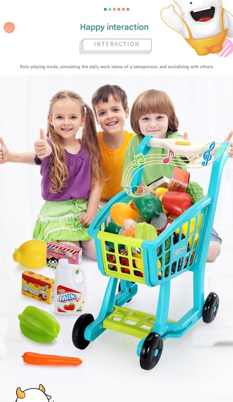 boy playing with supermarket shopping cart toy